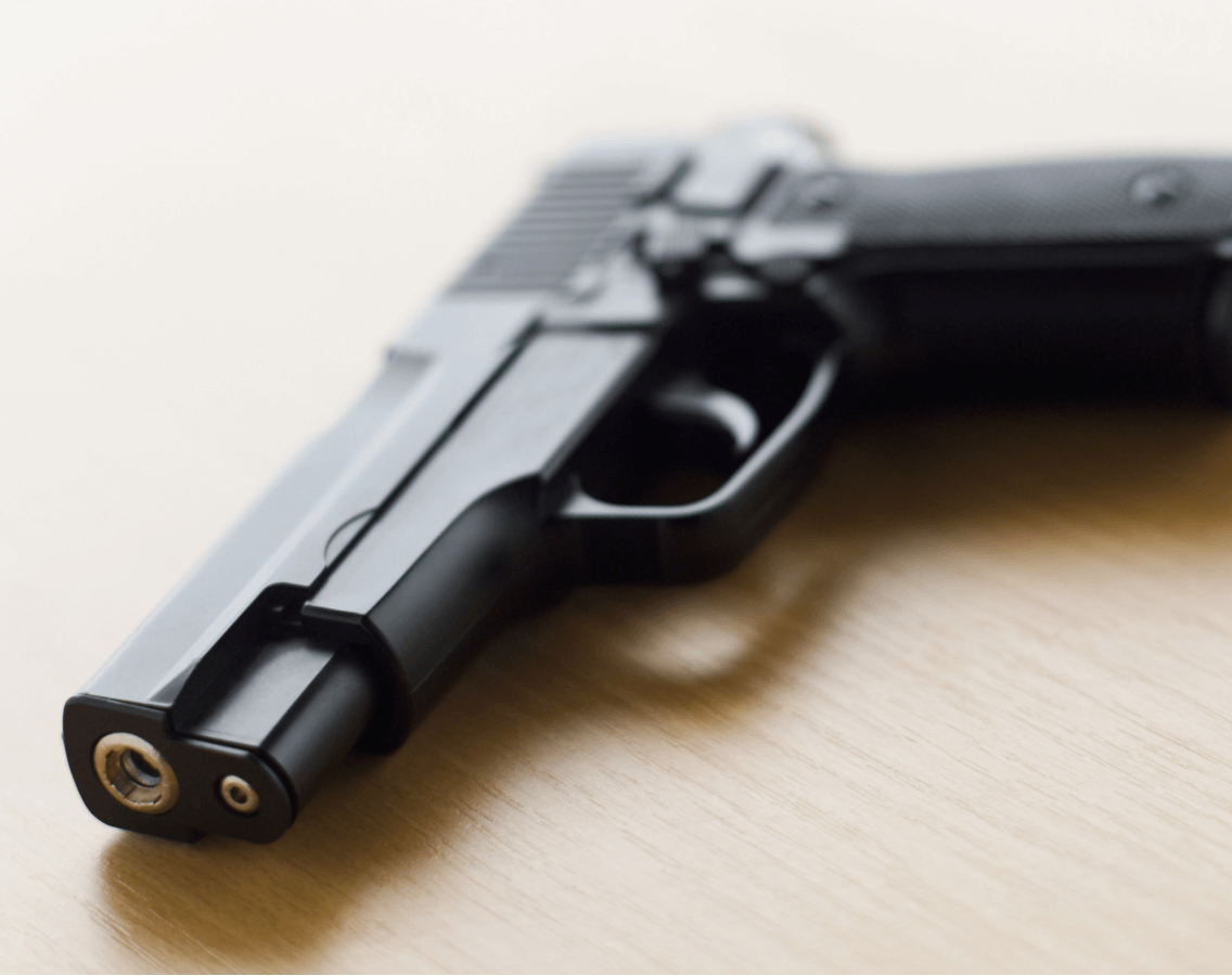 a pistol lying on a table