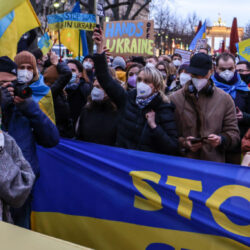 protesters marching in support of Ukraine