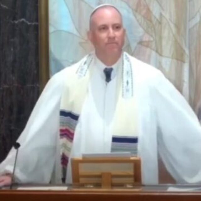 Rabbi Joel Mosbacher on the Bimah