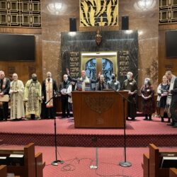 2022 Day of Service Interfaith Thanksgiving Service final benediction by Rabbi Mosbacher with all participating clergy standing on the Bimah